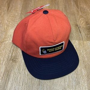 Puma golf hat “Never Playing Golf Again”.